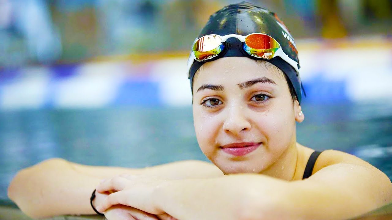 Thumbnail for the animated short Yusra Mardini: the swimmer resting at the edge of a pool