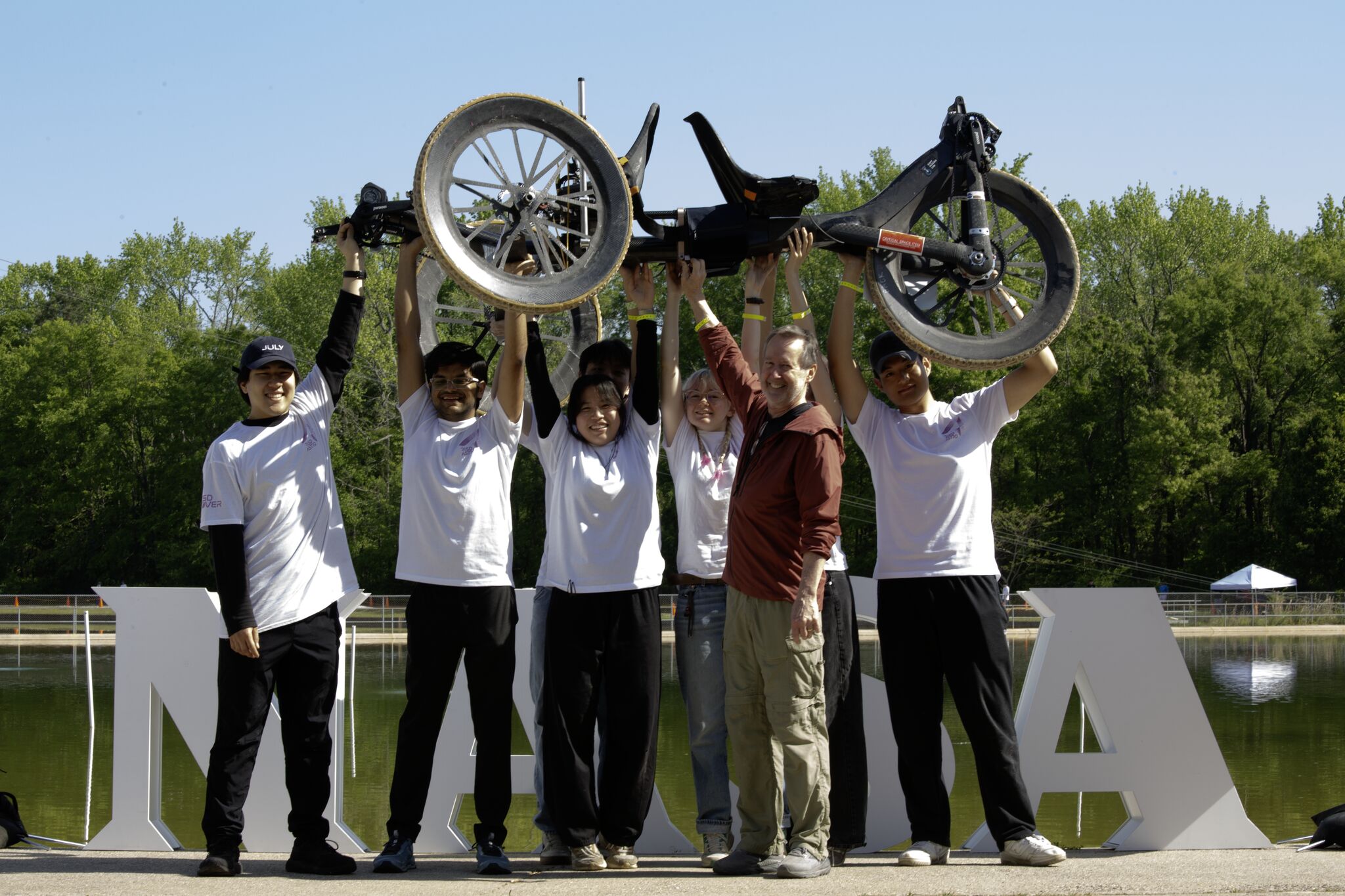Two riders seated on the finished RISD Rover