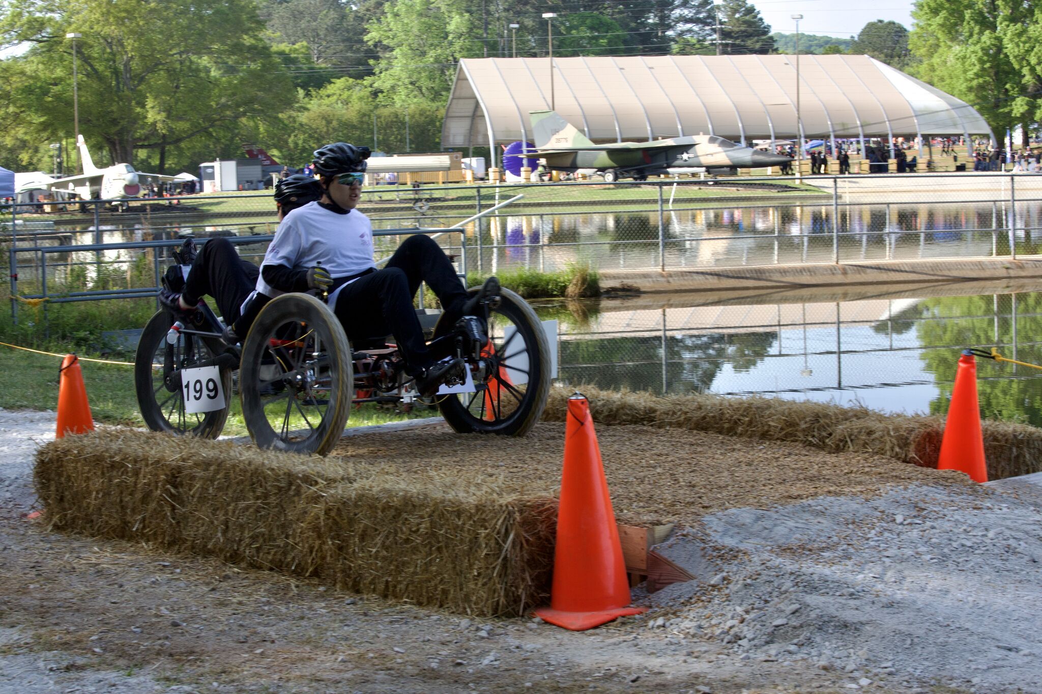 Rider steering the RISD Rover over an obstacle at NASA HERC 2026